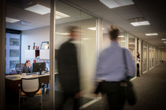 office action shot with motion blur of professionals