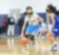 Young girl playing basketball