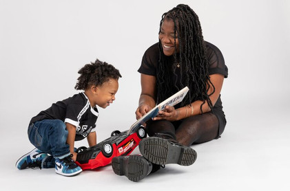 black mom and little boy family studio portrait