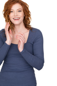 actor headshot 3/4 length laughing red hair pretty young woman
