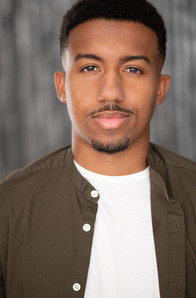 actor headshot sexy smirking black man