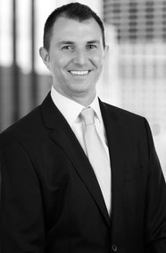 Executive portrait black and white building background
