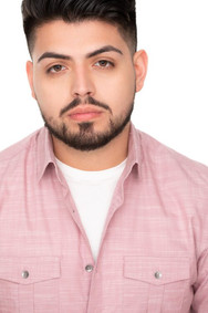 young man goatee headshot white background