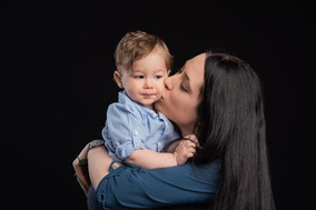 mom portrait with toddler loving kiss best mom