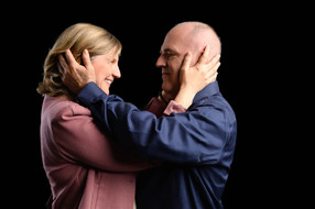 best loving couple's portrait black background
