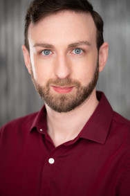 actor headshot young man trim beard