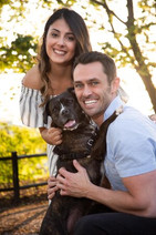 Outdoor chicago couple portrait with smiling dog