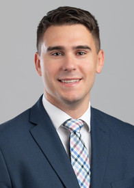 young white professional in suit and tie headshot portrait