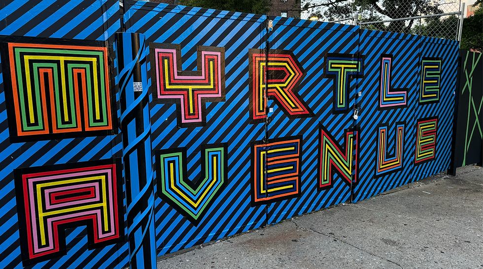 Eye-level view of tape art installation on a subway entrance
