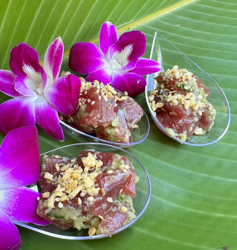 Close-up view of a colorful Hawaiian poke bowl with fresh fish and toppings