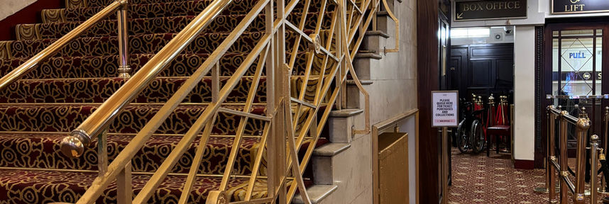 Staircase before floral installation in a luxury London interior