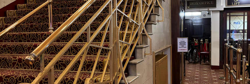 Staircase before floral installation in a luxury London interior