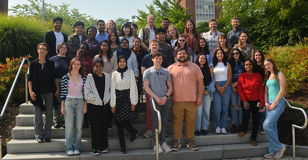 Group photo of faculty and students of the Biofilm group on steps