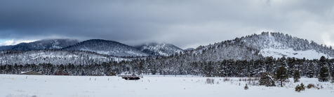 Panoramic photo of snow covered mountains in Williams, Arizona
