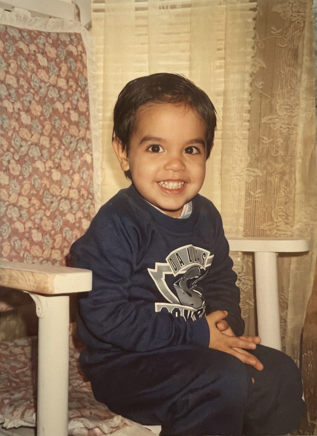 Michael Russo as a child in a Dallas Cowboys sweater