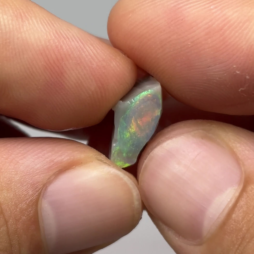 Thumbnail: Swirly Australian Mintabie Opal Rub