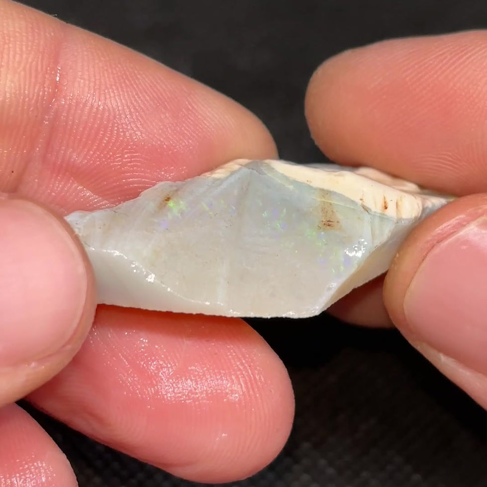 Thumbnail: Long Dark Colorful Coober Pedy Opal Rough