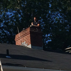 Jaimie sweeping chimney.jpg