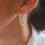 Thumbnail: Hoops with Yellow gold Wax Flower charms
