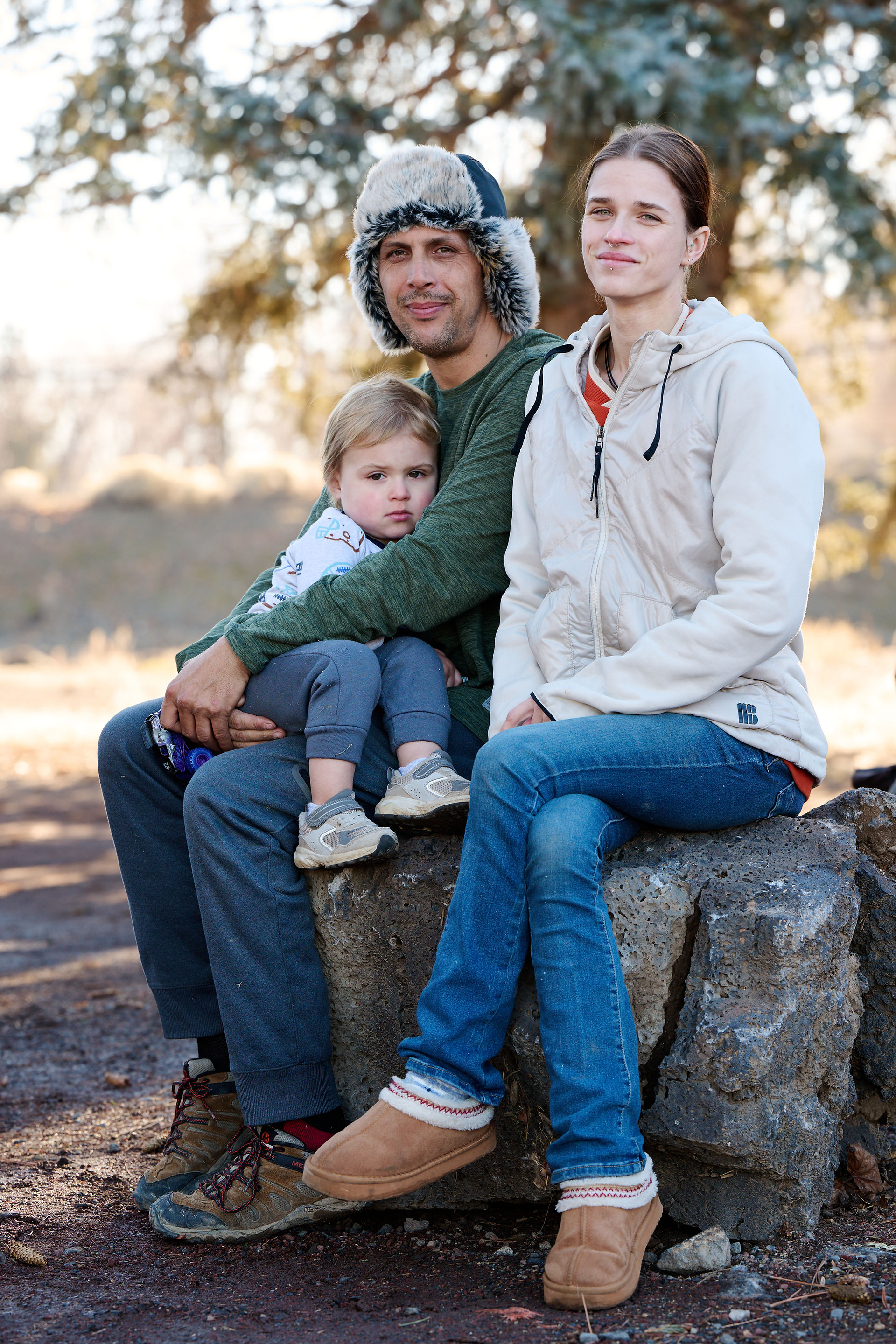 Mike and Marina Charlton with their two-year-old son. Redmond, Jan. 15. Photo by Joe Kline.