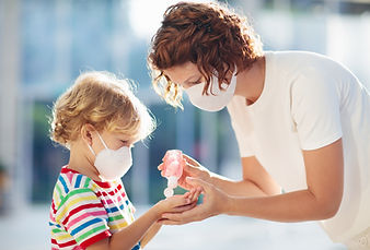 Family with kids in face mask in shoppin