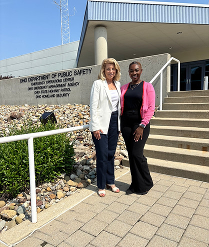 two woman in front of the Ohio Department of Public Safety building