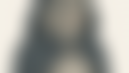 Illustration of a calm, regal feline Ranger wearing a deep navy cloak fastened with a silver ring and crescent moon pendant. The cat has sleek gray fur with subtle spots, vivid blue eyes, and a wise, serene expression. The soft lighting and minimal background highlight the character’s quiet strength and mystical presence.