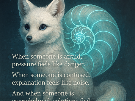 A soft, white fox with bright blue eyes sits against a deep teal background. A large glowing nautilus shell, outlined in turquoise light, spirals across its back. The fox’s tail has three small glowing blue dots near the tip. Text appears on the left side of the image in white serif font, reading: “When someone is afraid, pressure feels like danger. When someone is confused, explanation feels like noise. And when someone is overwhelmed, solutions feel like storms.” The overall tone is calm, gentle, and reflective.