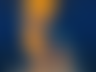 “A glowing twilight-blue lynx named Solstice sits calmly against a deep blue background. Her fur shifts between cool blue and warm golden tones, and her lantern-bright amber eyes shine in concentric rings of light. She wears a small metal loop on a thin cord around her neck. Below the image, text reads: ‘She shows people how to see the truth inside the fog. Her light doesn’t command, demand, or overwhelm. It simply glows—warm, steady, patient—until the shadows decide they’re ready to soften. And in a world built on growth, reflection, and forward motion, that kind of light is not just helpful. It’s essential.’”