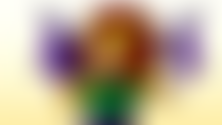 A cheerful cartoon lion with a red mane, yellow fur, and bright purple bat-style wings stands giving a big thumbs-up. He wears a green sleeveless shirt and dark shorts, smiling confidently against a soft yellow gradient background.