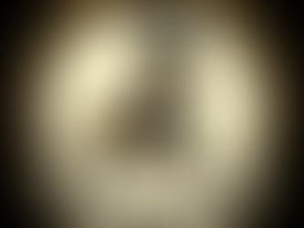 Circular emblem for the Empire Network featuring a regal golden stag-like creature wearing a dark blue scarf, leather harness, and tall black top hat. The animal stands proudly within a gold and brown circle. Around the border, the text reads: “Be the reason someone else can be their best today.” at the top, and “Empire Network” at the bottom. The design symbolizes leadership, collaboration, and the continuous pursuit of excellence.