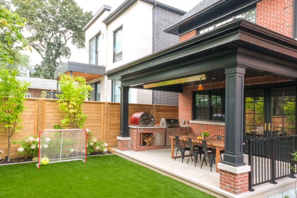 Backyard landscape design and outdoor dining room in Toronto.
