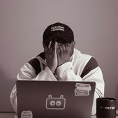 A man frustrated with his computer.