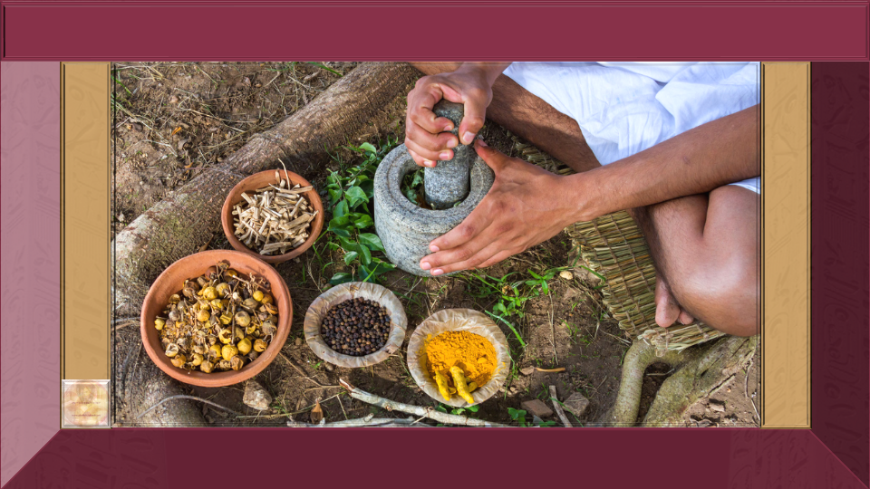 Indian man using a mortar and pestle with herbs