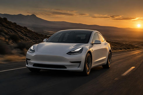 White Tesla Model 3 driving a Northern Nevada highway at sunset (illustrative photo)