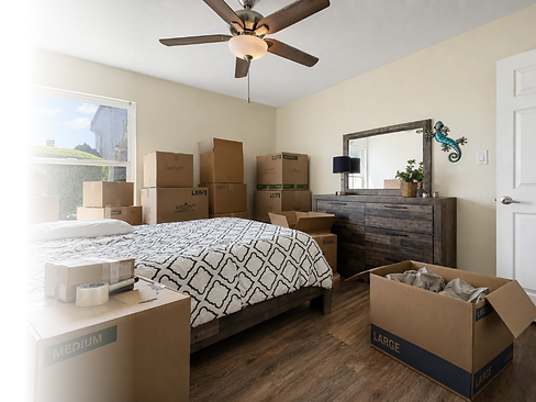 thinking-of-downsizing-room-with-boxes.png