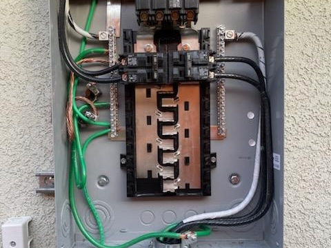 Close-up of electrical outlet and circuit work