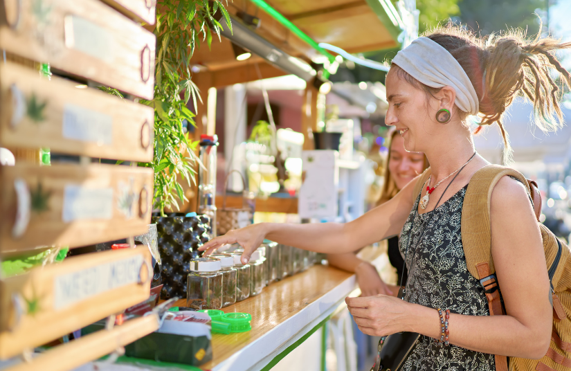 lady buying medical marijuana at a local farm dispensary