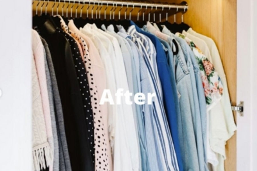Clothes neatly folded and organised in a wardrobe after a professional wardrobe edit