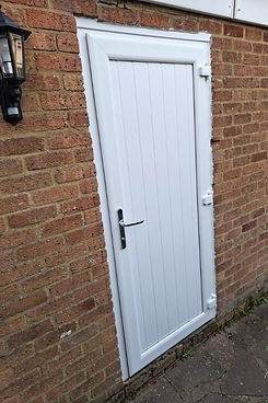 White outside door with a smart silver handle