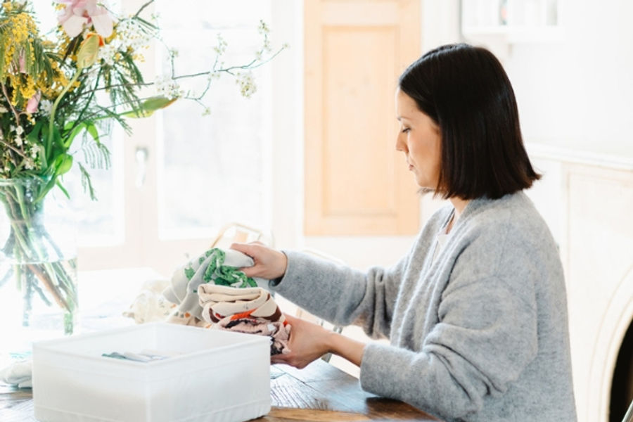 A cluttered room at home filled with belongings that need decluttering and organising