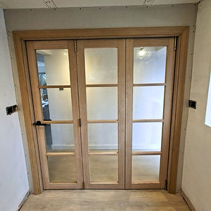 Oak Bifold door custom made by TOB Carpentry