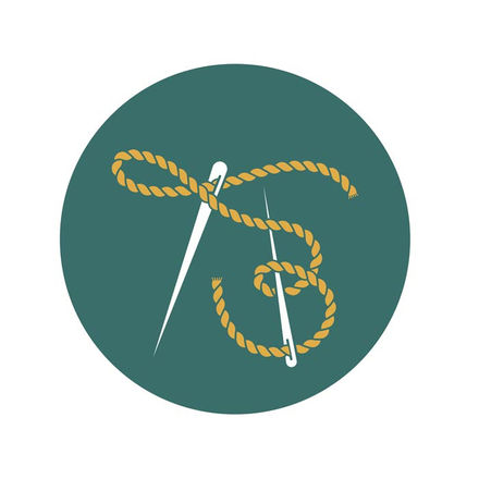 Artisan wordmark for Thread Bearers: A continuous rustic thread curves through the eyes of two needles integrated into the typography—one forming the 'T' and the other forming the 'B'—with the thread looping to shape the letterforms.