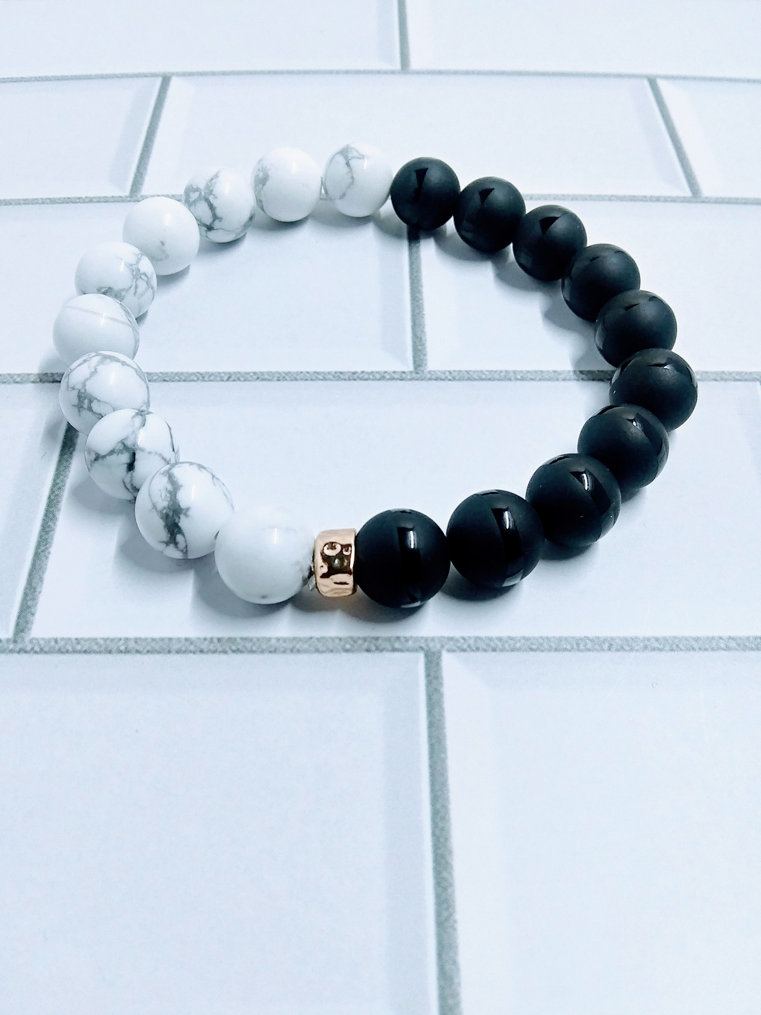 Black and White Bracelet with Gold plated focal bead at the center