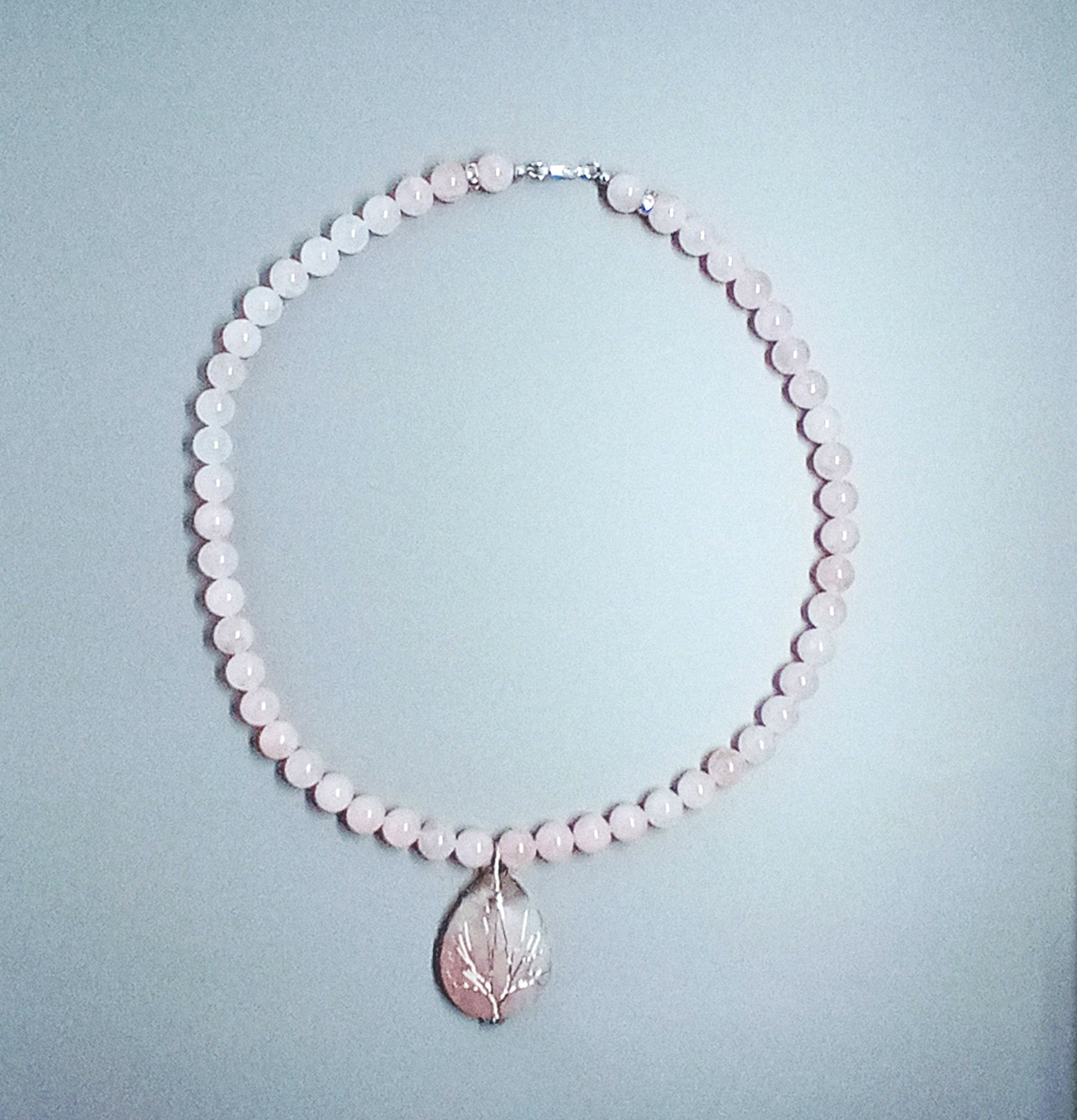 pink pendant necklace top view