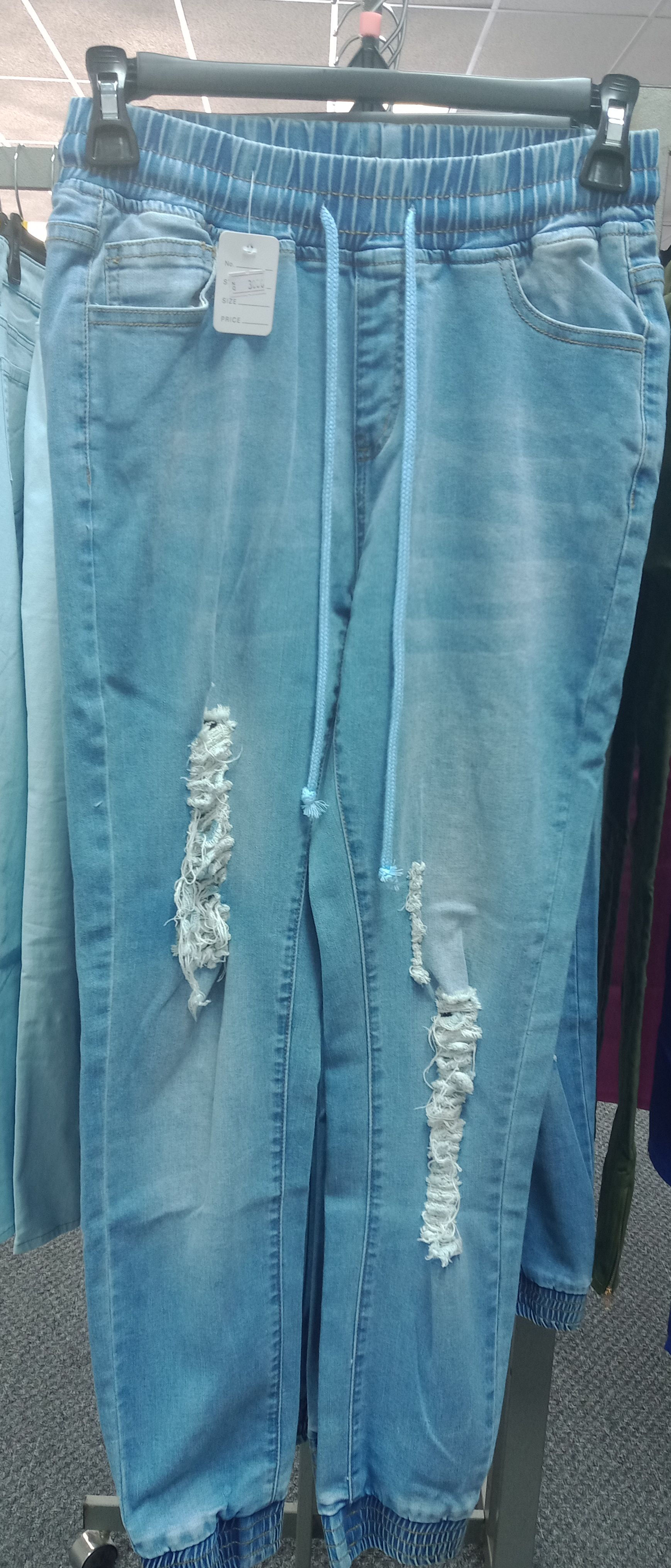 Rip Jeans (tight at the ankle)