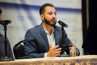 Jason Speaking Sitting Panel.jpeg