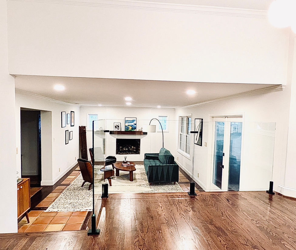 Glass guardrail and staircase view from Brookhaven, GA living room