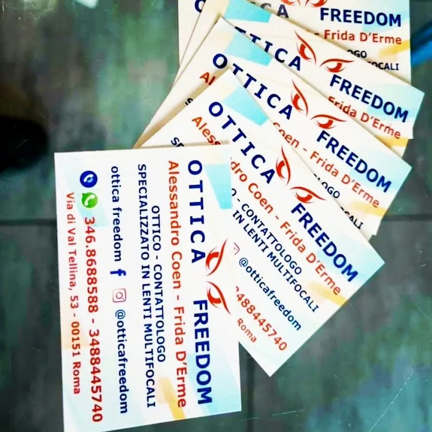 Biglietti da visita Ottica Freedom con Alessandro Coen e Frida D'Erme contatti