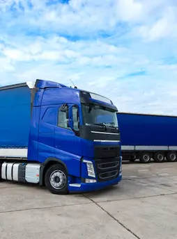 truck-vehicle-with-trailers-background_342744-1297.webp